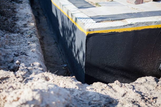Professional Waterproofing technician working in New Concord, OH